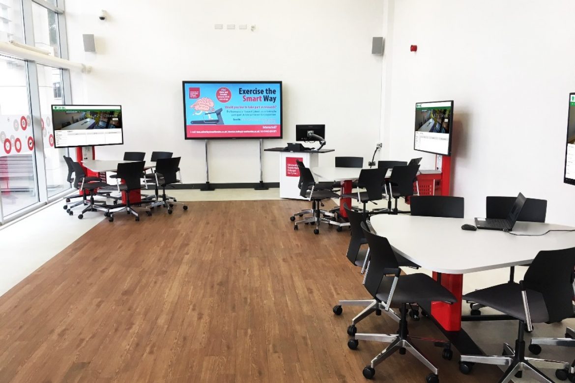 AV furniture for underutilised space at University of South Wales, three tables and lecturn