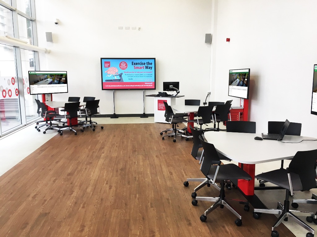 AV furniture for underutilised space at University of South Wales, three tables and lecturn